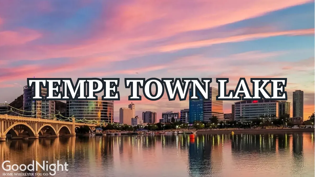 Tempe Town Lake stretches across the scene, reflecting the city skyline and multiple bridges. The calm water and open sky set a peaceful tone, inviting activities like kayaking, paddleboarding, and waterfront walks.